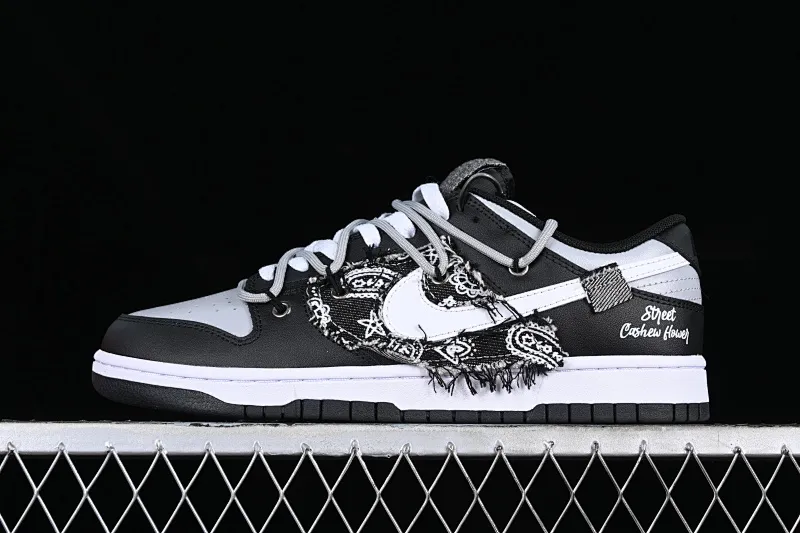 All categories Nk SB Dunk series Nk SB Dunk Low Low-top sneakers Nk Dunk Low Cashew flower graffiti Stitched denim asymmetric deconstruction SB strap low-top casual sneakers DV0831-002